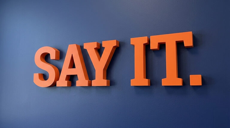Navy wall with "Say It" text — the script to start a hard conversation at work